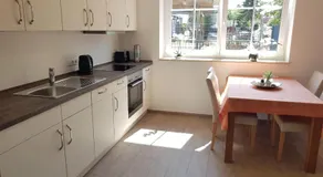 Appartement adapté aux familles avec jardin - Image 2