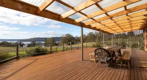 Norfolk Bay Retreat - views over the sea and vines - Image 3