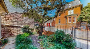 Historic downtown townhome with brick courtyard, sunroom & parking - Image 5