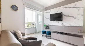 Apto moderno com churrasq. a 600m da praia COM305 - Image 2