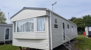 Coastal Comfort Relaxing 3-Bed Holiday Home at Marlie Holiday Park - Image 4