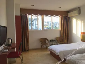 Jixi Motel Business Hotel - Image 5