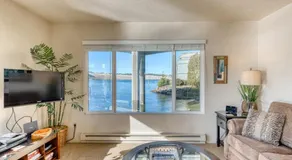Incredible Riverfront Oasis with Wraparound Deck & Cozy Interior - Image 2