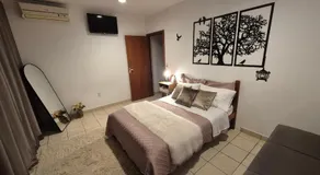 Suite climatizada, ao lado da praca principal - Image 2