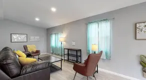 Bright basement unit with large yard and sunroom - Image 2