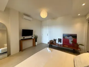 Beachfront Apartment with Kitchen and Outdoor Seating Area - Image 2