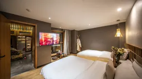 Lijiang Muqian Hotel - Image 4