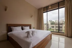 StayVista's Greenwoods Villa 5 - City-Center Villa with Private Pool, Terrace, Lift & Music System - Image 2