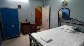 Shantiniketan Bungalow with green lawn - Image 2