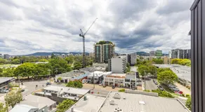 West End 2BR Gem with Rooftop Pool, Balcony & Parking - Image 5