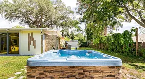 Close to beaches with hot tub and large garden - Image 3