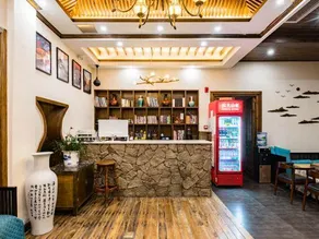Fenghuang Qingwu river view homestay - Image 5