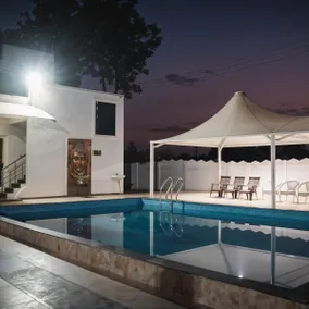 Anandam Orchard |3BR| Farmstay by Homeyhuts - Image 3