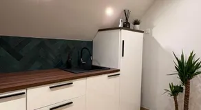 Superbe appartement avec jardin et parking privé - Image 4