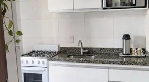Apê estiloso e funcional no coração da cidade - Image 5