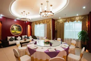 Shiwai Taoyuan Hotel - Image 4