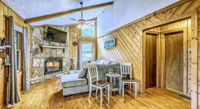 Peak-a-Blue Cabin - Watch Movies from Hot Tub, Mountain View, Bigfoot Bunker Game Room, Fire Pit, Oversized Deck, Screened-in Porch - Image 2