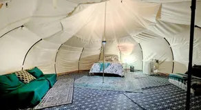 Scenic Glamping Tent Stay with Cozy Lounge Space in Smithville, Texas - Image 2