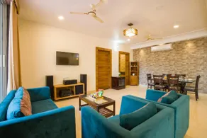 Alaya Stays 5 BHK Roohmon's Farm with Private Pool, Garden & Bar - Image 5