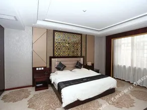 Huating Qianhe Hotel - Image 5