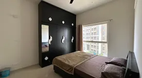 Spacious 2BHK Apartment in GIFT City for Families & Pros with Free Parking and pool - Image 2