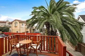 Beach Block 2-Bed with Coastal Palm Trees and Yard - Image 4