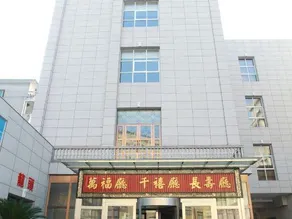 Huang Longshun Hotel - Image 4