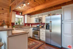 Zen Den - Beautiful A-frame cabin with classic brick wood burning fireplace and a hot tub - Image 3