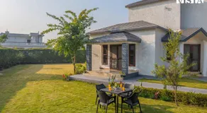 StayVista at Olive fields with Shared pool, BBQ - Image 5