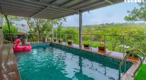 The Glasscape by StayVista - Hillside getaway with Pool and Indoor games - Image 5