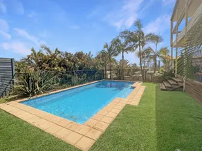 Coastal Upper-Level Home with Pool Access - Image 4