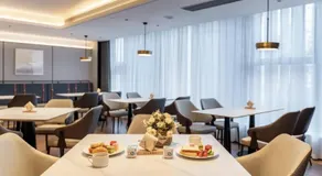 Huanman Hotel Baoji Jintai Avenue Branch - Image 5