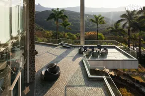 StayVista's Emerald Acres offering a heated pool, bonfire, snooker table, scenic views, tennis court, steam room, gazebo, & gym - Image 5