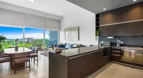 Modern condo with breathtaking views, infinity pool, and en suite bedrooms - Image 3