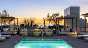 Pearl Coast - Modern 2BR with Rooftop Pool & Views - Image 2