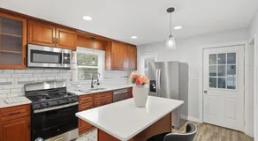 The Sunset Getaway, Modern 3BR w Deck Minutes from I-65, Fenced Yard - Image 3