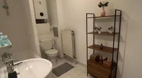 Modern 1BR and Sofa Bed Near Airport - Image 2