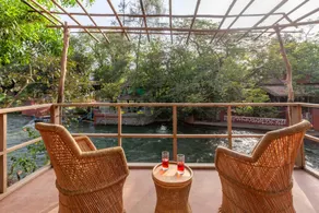 StayVista's Santoni Farms - Riverside Bliss with Pool, Orchard & Activities - Image 5