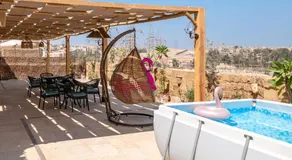 Pyramidia Serene with Rooftop, Pool & pyramids view - Image 3