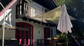 Espaco arborizado com Casa e Chale em bairro nobre de Monte Verde - Image 4