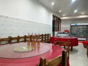 Wuding Youhua Business Hotel - Image 4