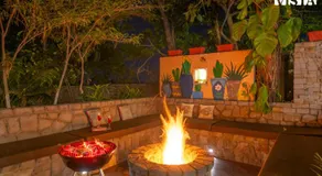 StayVista at The Hideout Farms with Lawn and private Pool - Image 2