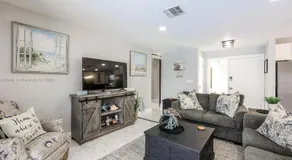 Waterfront 3BR Pool Oasis with Dock, Grill & Lounge - Image 2