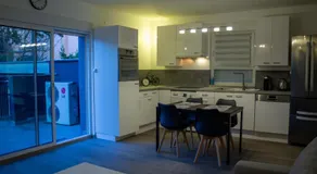 Joli appartement en RDC dans une maison neuve - Image 5