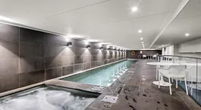 Bright Inner-North Stay with Pool Access - Image 5