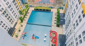 Fancy and Nice 1BR at Paramount Skyline Apartment By Travelio - Image 3
