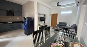 Spacious 2BHK Apartment in GIFT City for Families & Pros with Free Parking and pool - Image 3