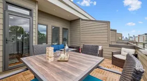 Spacious 3-Story Townhome w Rooftop & City Views - Image 5