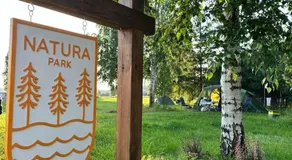 Natura Park Jurmala campsite with tent sites near a river - Image 3
