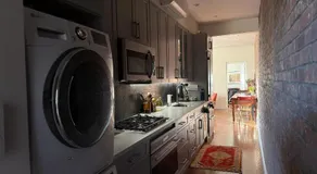 Sunlit Luxury 2BR Harlem Brownstone Retreat - Near Express Trains - Image 3
